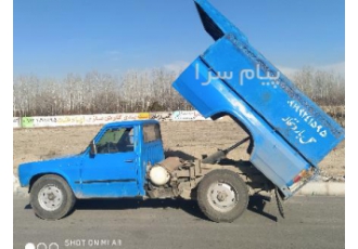 حمل نخاله توسط نیسان کمپرسی با کارگر