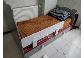 تخت و تشک نوجوان با یک میز تحریر ساده بزرگ در تهران تخت نوجوان قابل باز